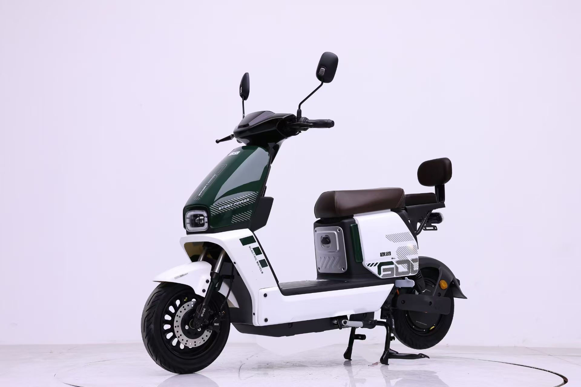 Green and white electric scooter with passenger backrest