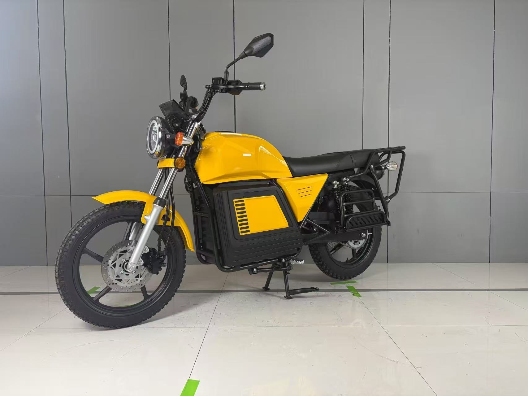 Yellow electric motorcycle with rear luggage rack